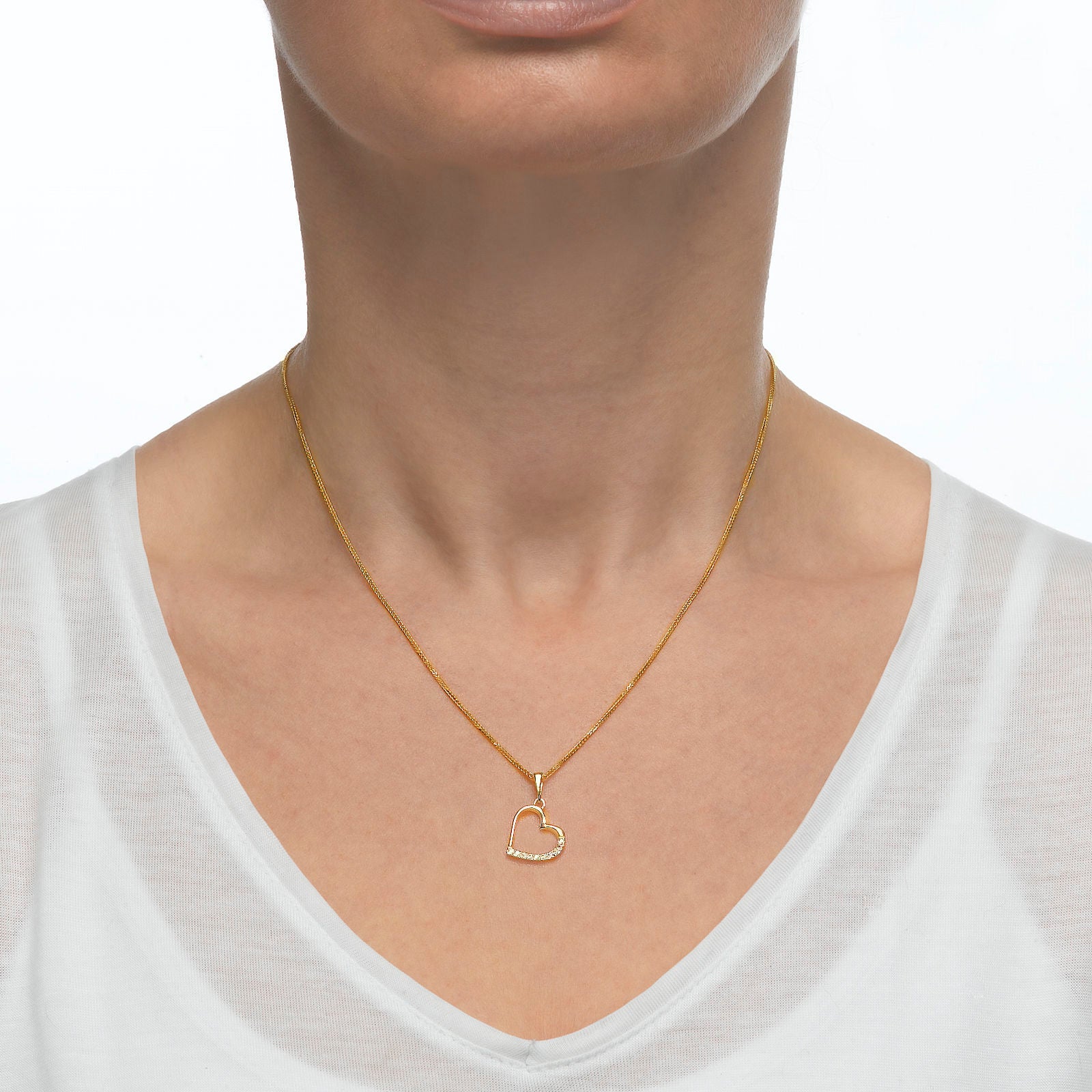 תליון מזהב צהוב 14 קראט - לב מנצנץ תליון מזהב צהוב 14 קראט - לב מנצנץ