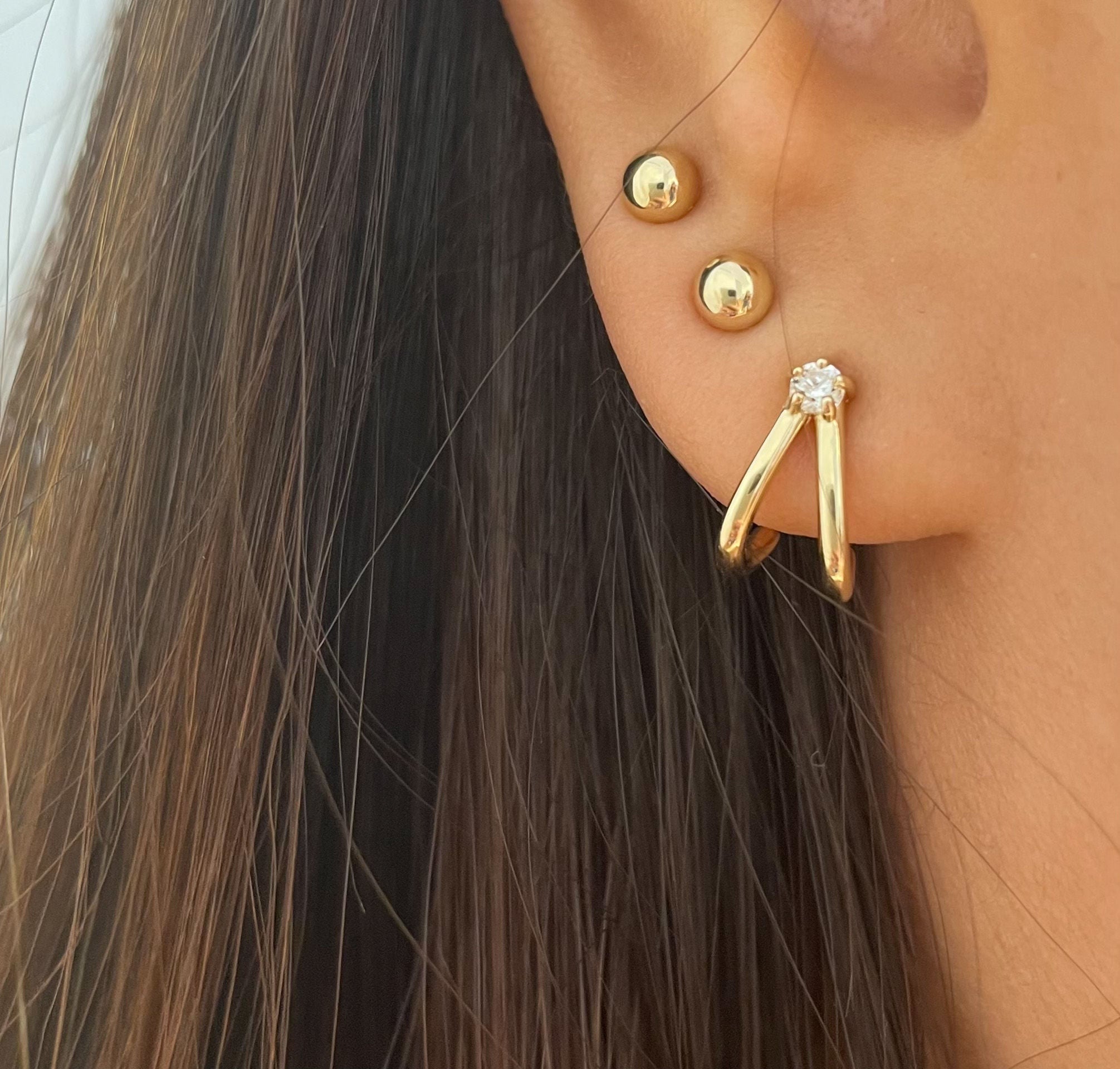 עגילי האגיס מזהב צהוב 14 קראט - סיקרט עגילי האגיס מזהב צהוב 14 קראט - סיקרט