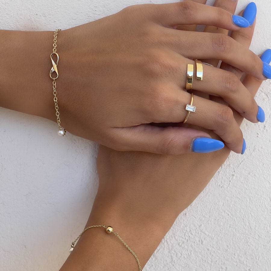 צמיד לאישה מזהב צהוב 14 קראט - אינפיניטי פנינים גדול צמיד לאישה מזהב צהוב 14 קראט - אינפיניטי פנינים גדול