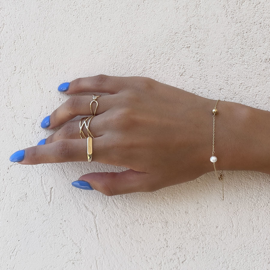 צמיד לאישה מזהב צהוב 14 קראט - פנינים וכדורי זהב צמיד לאישה מזהב צהוב 14 קראט - פנינים וכדורי זהב