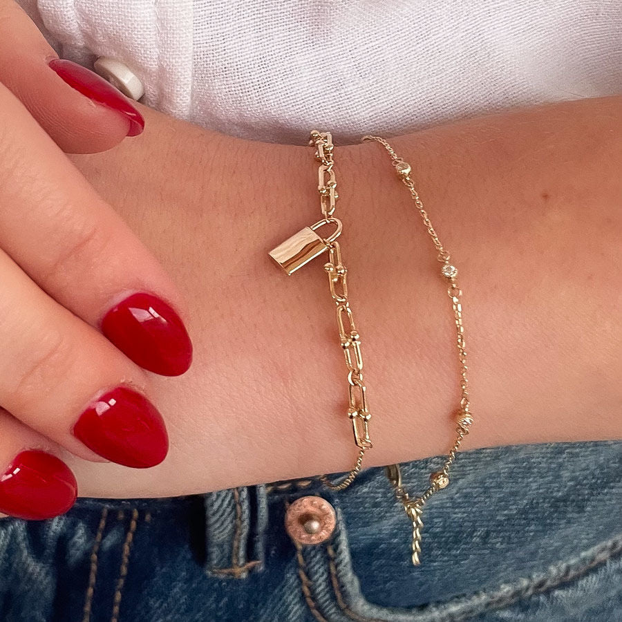 צמיד לאישה מזהב צהוב 14 קראט - מנעול צמיד לאישה מזהב צהוב 14 קראט - מנעול