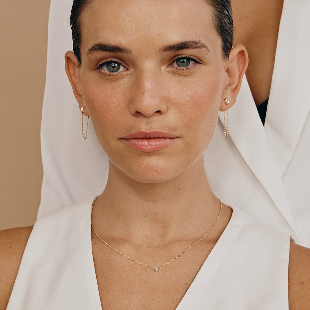 עגילים צמודים טופז מזהב צהוב 14 קראט - מירז' צלולים עגילים צמודים טופז מזהב צהוב 14 קראט - מירז' צלולים