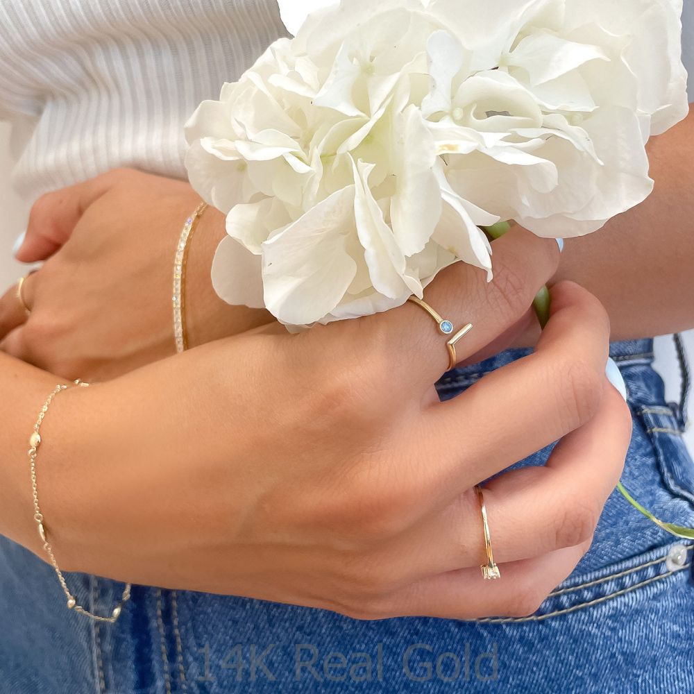 טבעות זהב | טבעת לנשים מזהב צהוב 14 קראט - סאן כחולה
